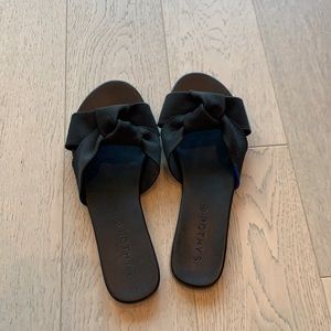Rothy’s, black “the knot” sandal, size 6.5